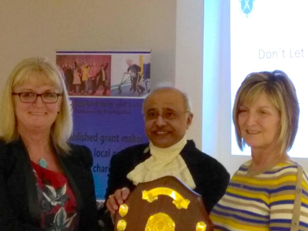 Cofounders and trustees of DLDD Sharon Knott and Sharon Warboys accepting the High Sheriff of Bedfordshire Award from High Sheriff Vinod Taylor.